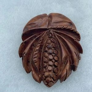 Antique-Vintage hand carved palm tree wood fur dress clip.